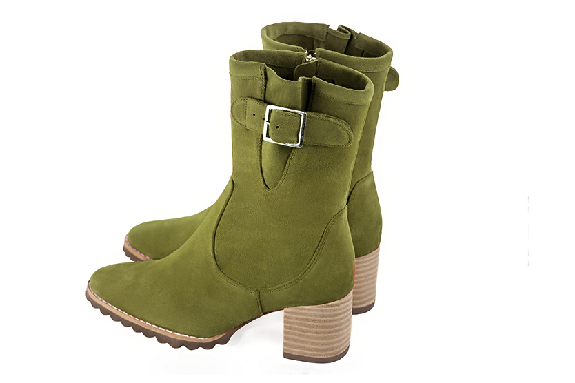 Pistachio green women's ankle boots with buckles on the sides. Round toe. Medium block heels. Rear view - Florence KOOIJMAN